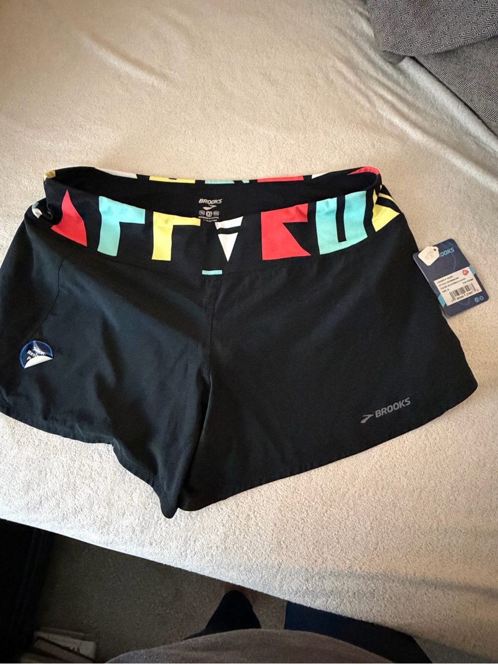 Brooks Black Athletic Shorts with Multicolor Geometric Waistband